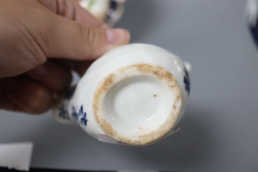 An 18th century Worcester blue scale plate, diameter 19.5cm and a sauceboat